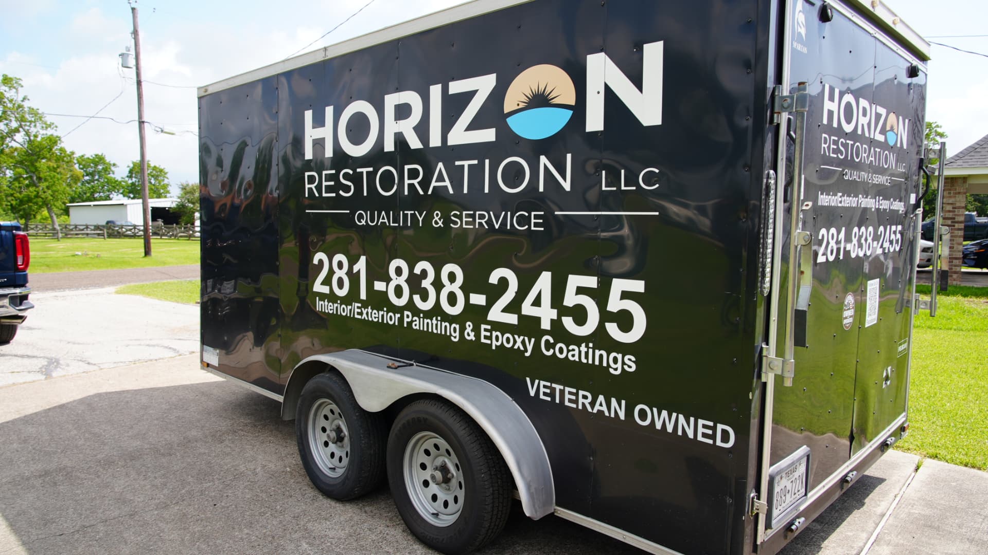 Horizon Restoration LLC branded work trailer