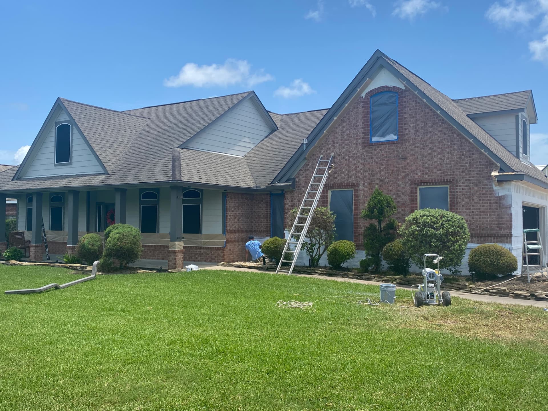 Before — brick exterior home before professional painting in Baytown, TX